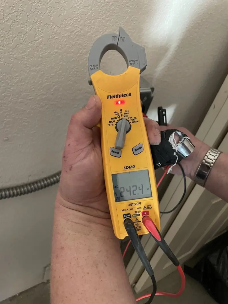 Voltage testing with clamp meter during Hot Tub / Pool Electrical Wiring in Falmouth